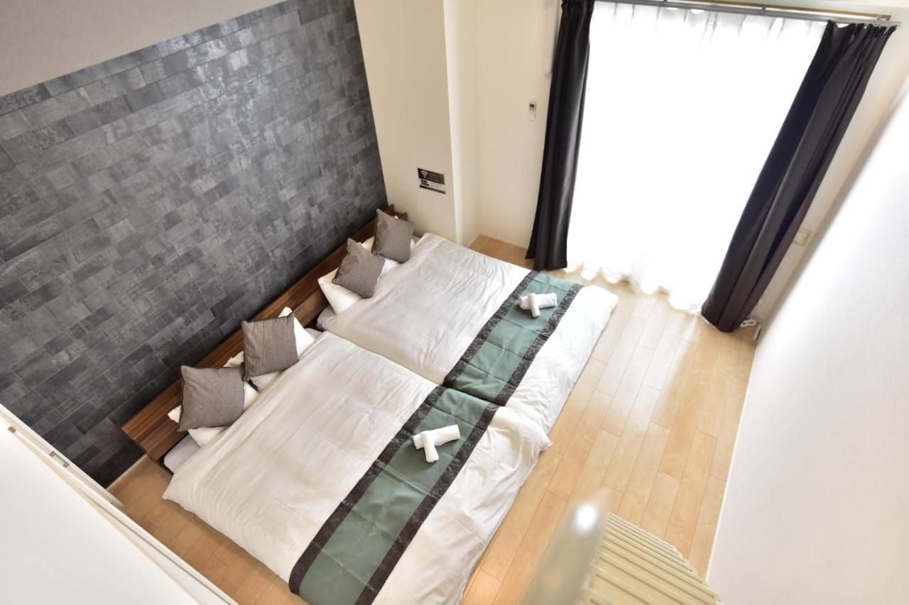 Ferienwohnung モノトーン難波 Ōsaka Exterior foto